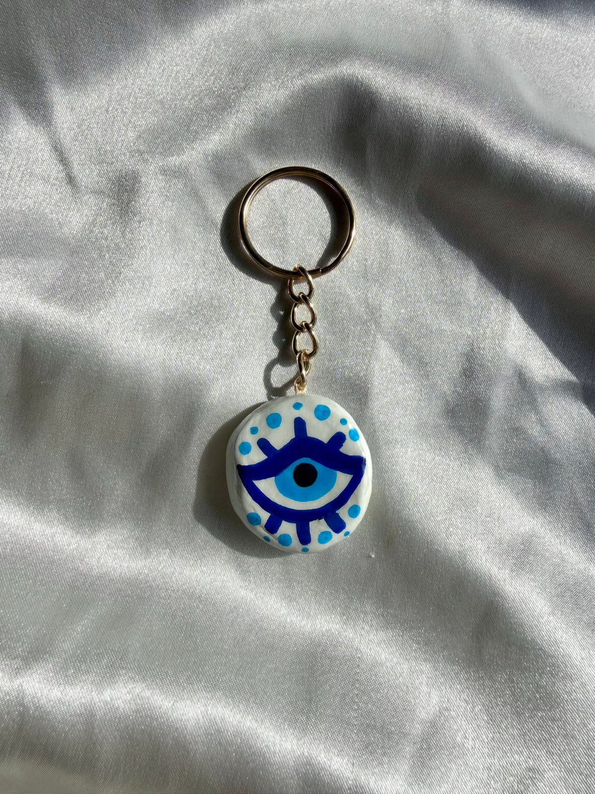 Evil Eye & Mystical Loop keychain charms, handmade clay bag keychain charm