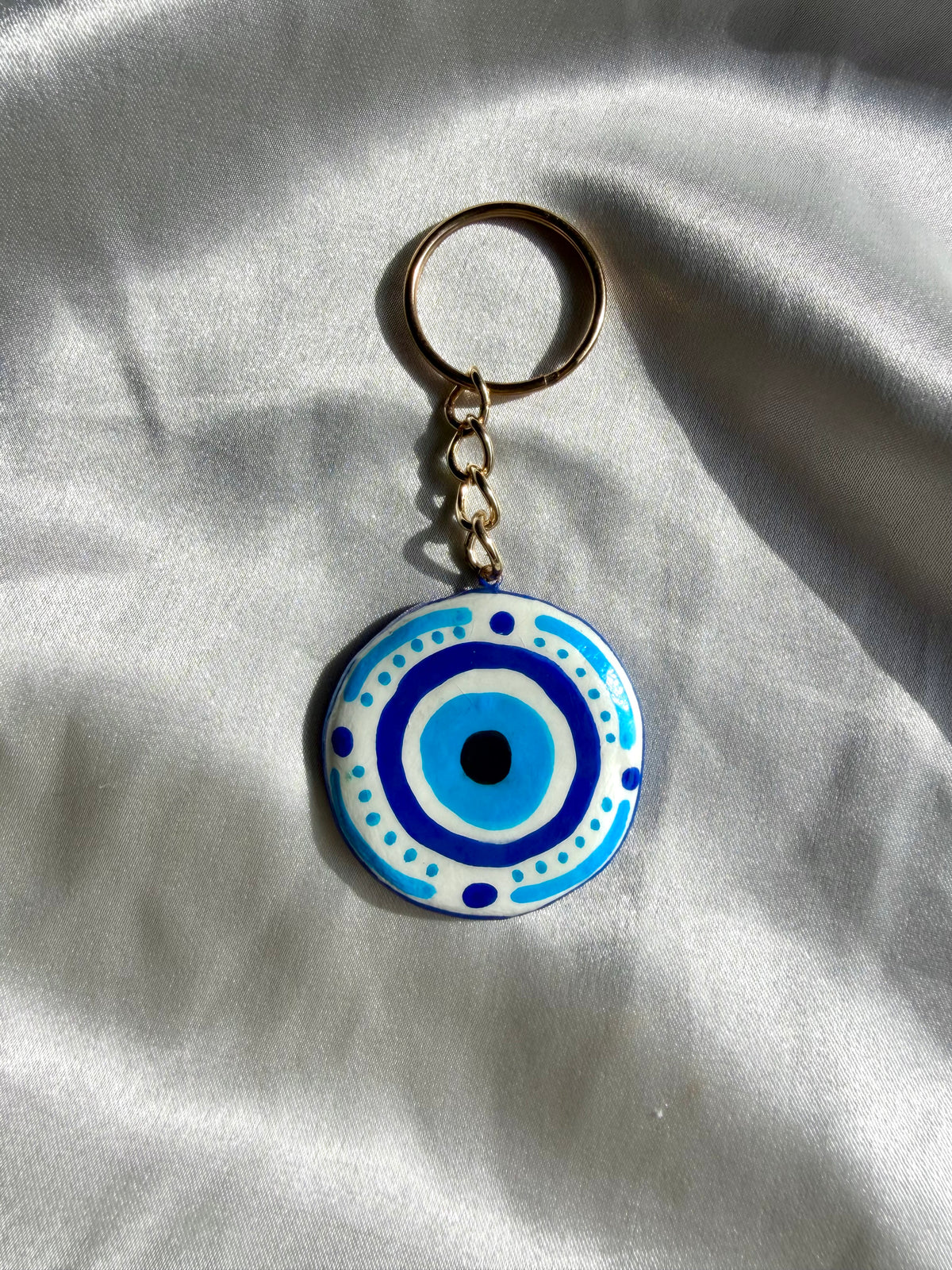 Evil Eye & Mystical Loop keychain charms, handmade clay bag keychain charm