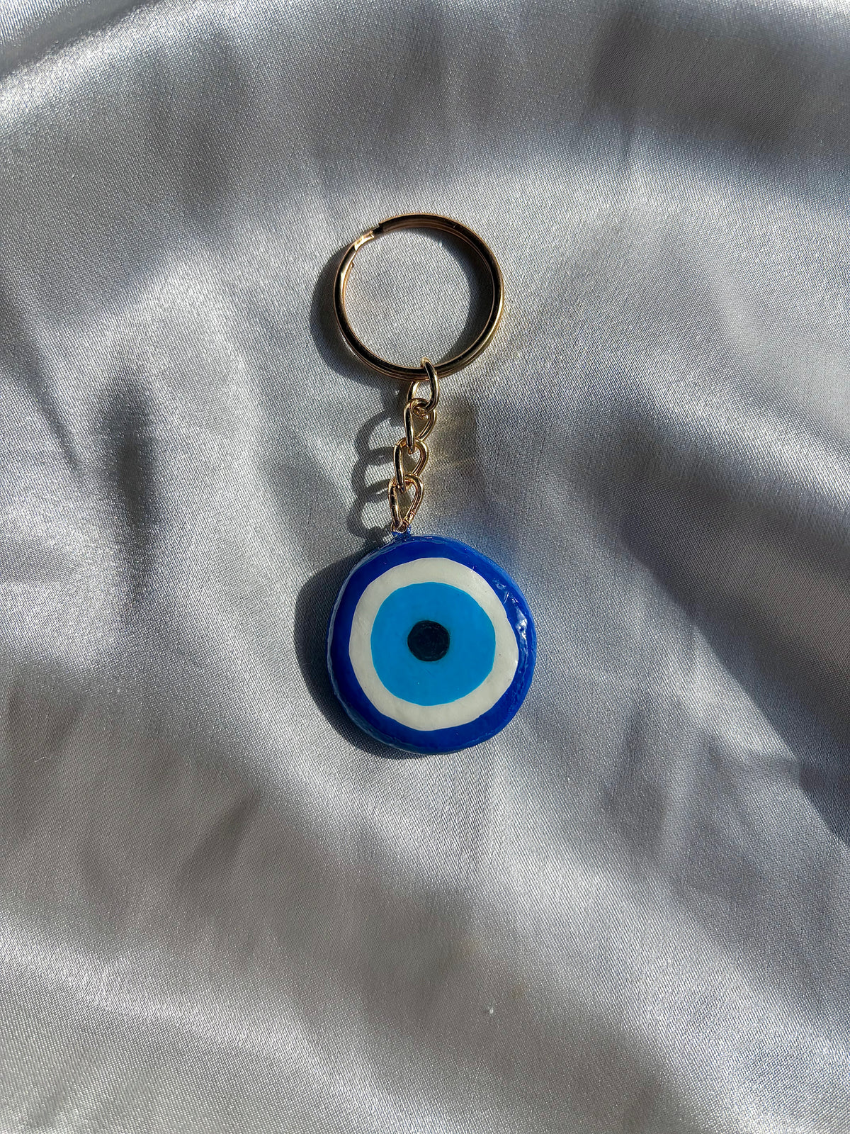 Evil Eye & Mystical Loop keychain charms, handmade clay bag keychain charm